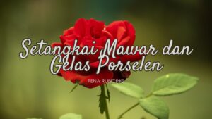 setangkai mawar dan gelas porselen
